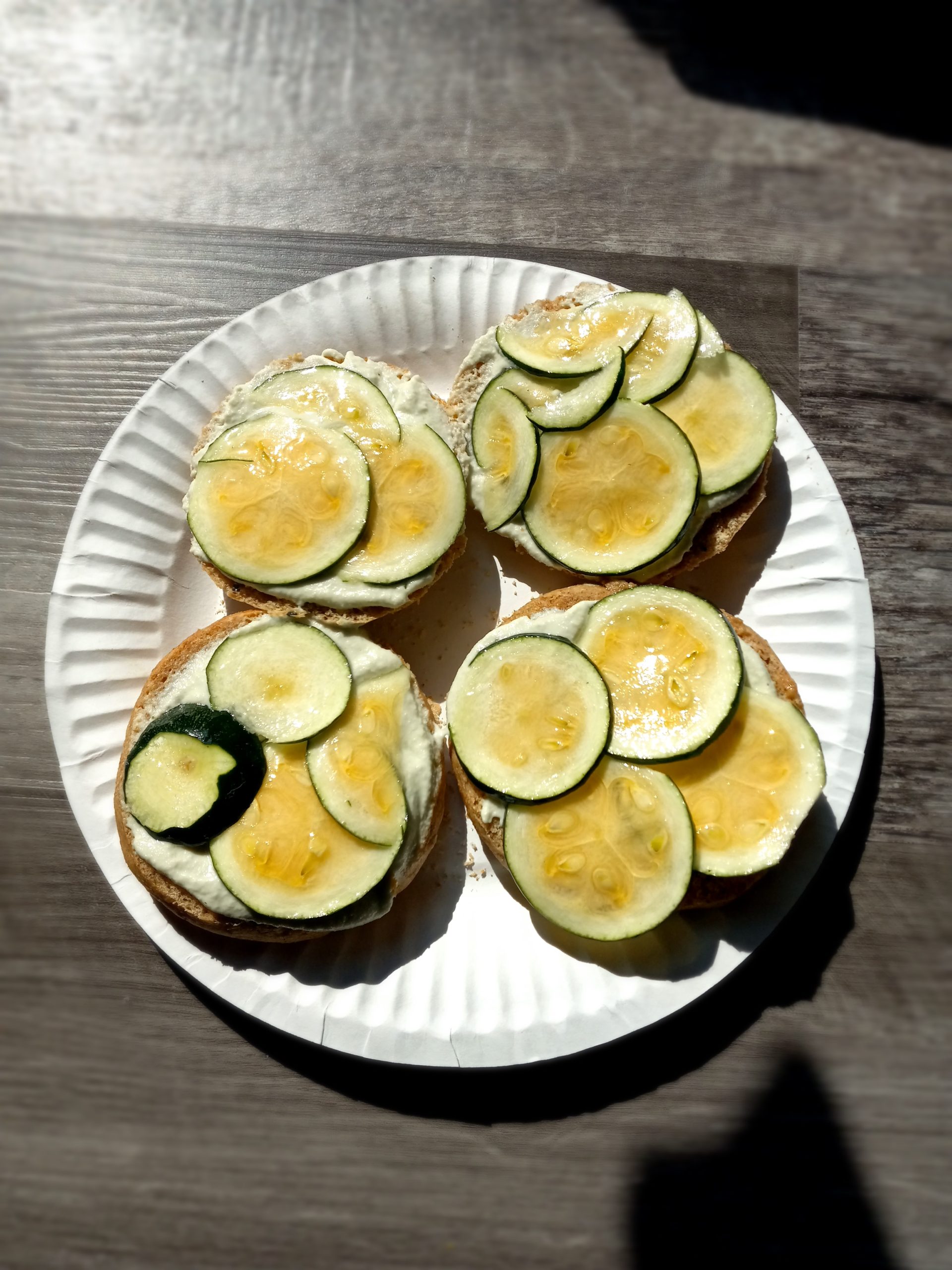 Picture of marinated zucchini on 4 slices of spelt bread.