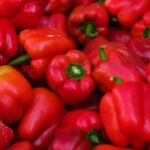 a close up shot of red bell peppers