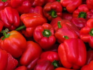 a close up shot of red bell peppers