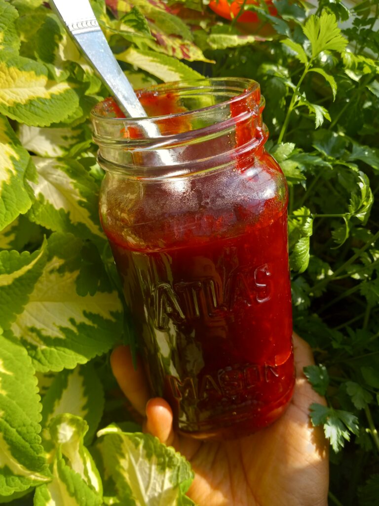 glass jar of cranberry cinnamon jam