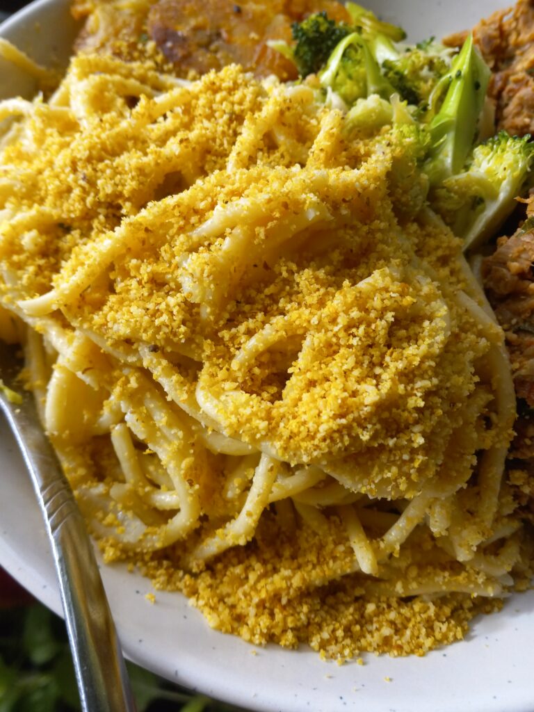 Toasted Walnut & Nutritional Yeast Topping on Spaghetti.