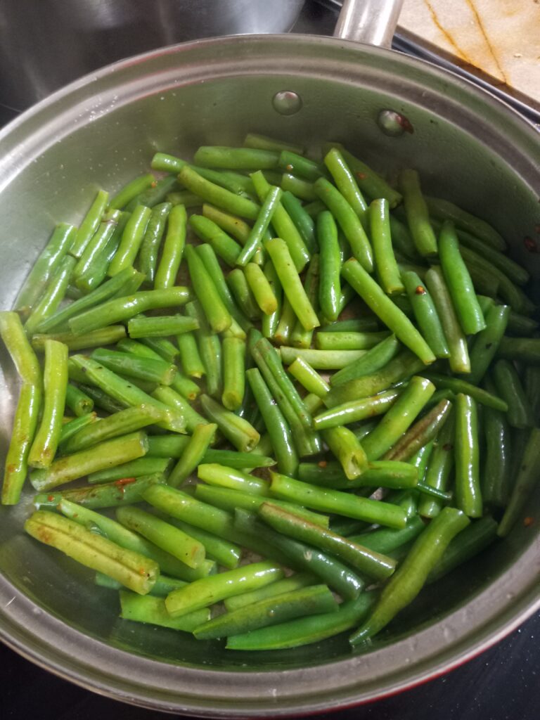 Pan of Coconut Oil Green Beans with Garlic