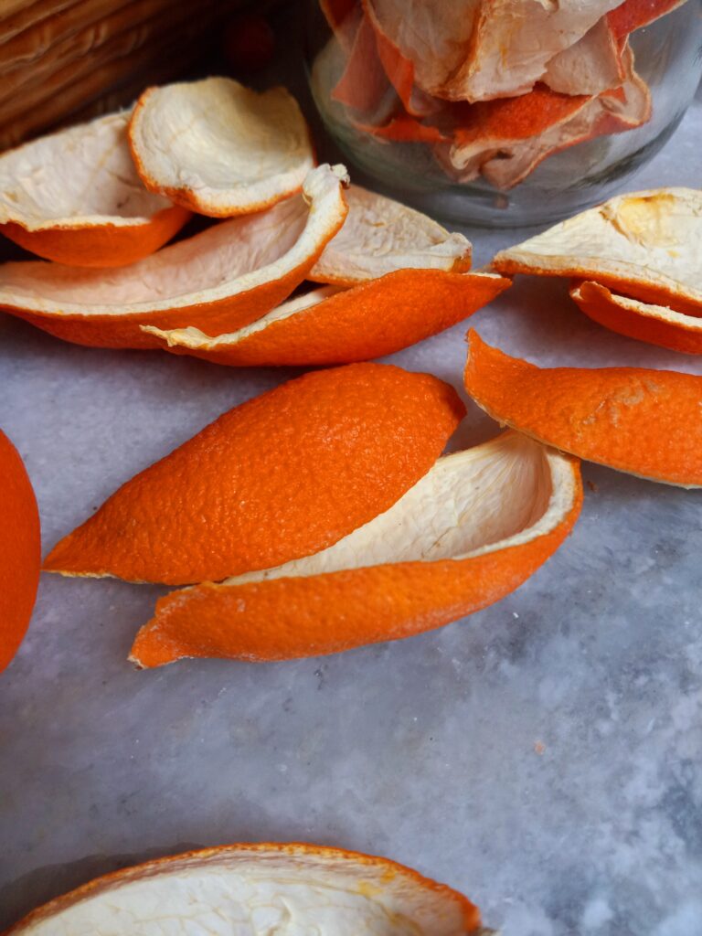 dried orange peels on a counter.